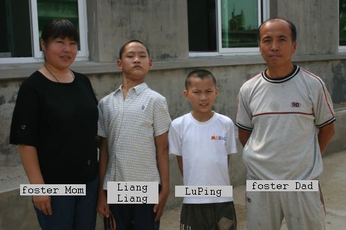 photo - Liang Liang and LuPing with foster mom and dad